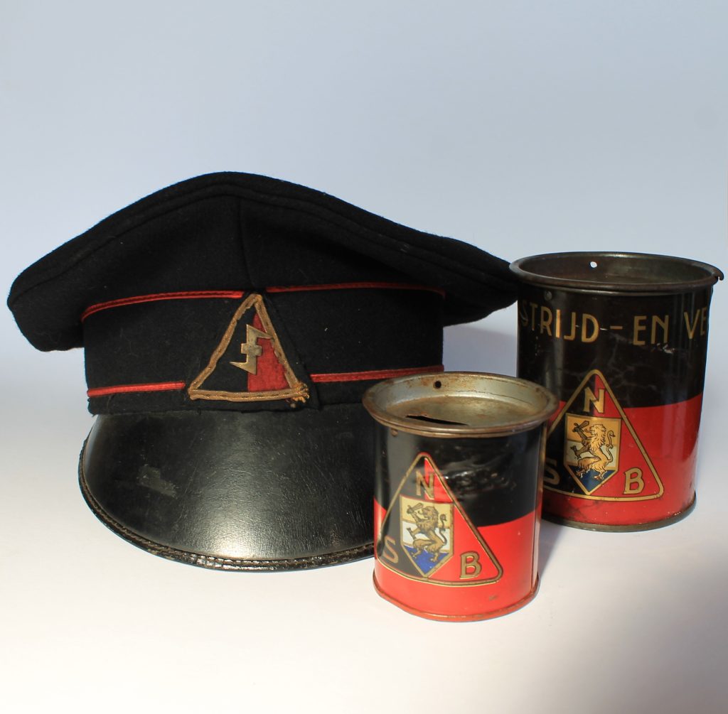 NSB spaarpot en SS-pet. Museum Collectie '40-'45. Bron foto: Chimène de Jonge