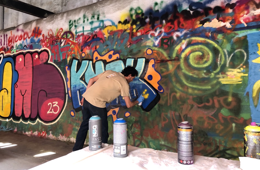 During the open graffiti workshop organized by the YesYouCan.Spray street art collective, people can learn how to master as spray can.