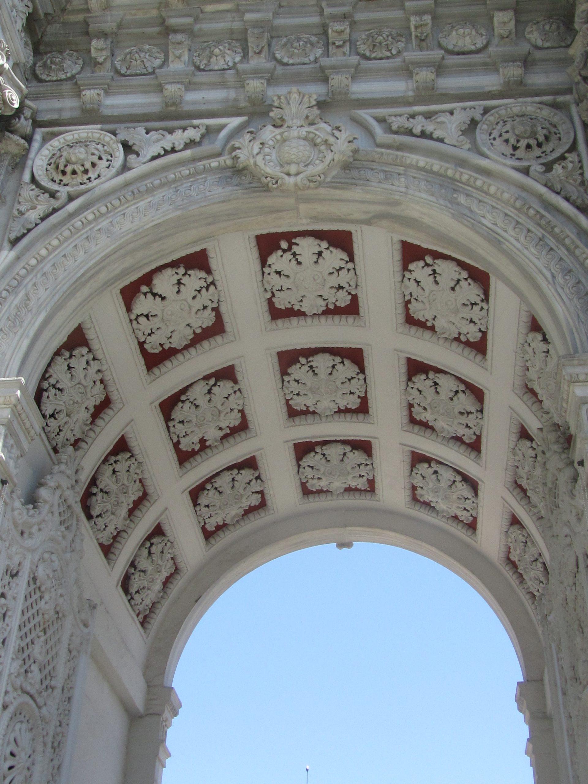 The detailed carvings in the gate