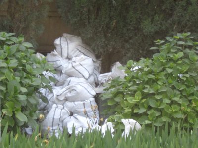 Supplies lie in the open by the construction site