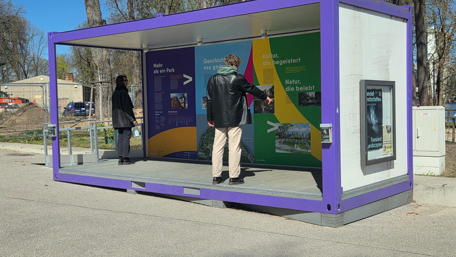 Visitors at Spreepark stop at one of many information boards that explain what the park is planned to become.